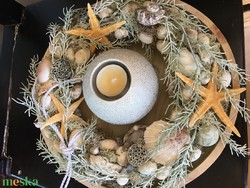 Seashell table decoration on a wooden bowl