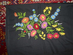 Decorative cushion embroidered on a black base, 45 cm x 59 cm