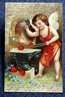 Antique embossed greeting card heart-forging angel