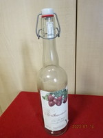 There was strawberry wine in a white 0.75 l bottle with a buckle. Jokai.