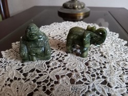 Oriental figures carved from mineral in one