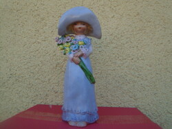 The bride is a 100% handmade masterpiece porcelain figurine in display case condition