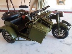 Military motorcycle with sidecar, equipped with a machine gun
