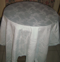Beautiful damask tablecloth with a light blue and white pattern