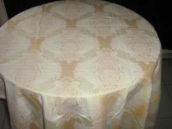 Beautifully patterned damask tablecloth with a pastel color combination