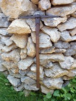 Old miner's pickaxe, wrought iron.
