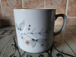 Zsolnay porcelain mug with floral pattern