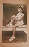 Károly Gyarmati: little girl with a bow. Photo.