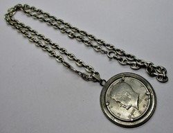 Kennedy half dollar in silver pendant on thick silver chain