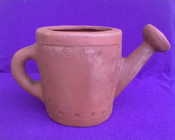 Unglazed ceramic watering can