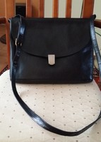 Beautiful occasion leather bag, size A4, in new condition