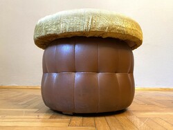 Retro round pouf seat with artificial leather cover tucked in at the bottom