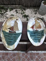 A sailing ship painted on a shell.
