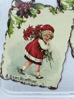 Romantic Christmas tree decoration with a little girl