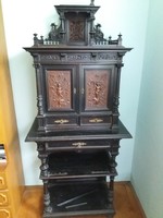 Pewter cabinet richly carved