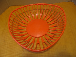 Rero 60 year old kayser ges. Gesch. Orange colored plastic basket with bread and fruit