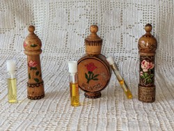 Bulgarian rose oil in a carved wooden holder