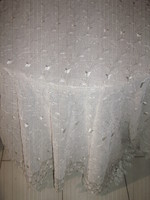 Wide lace curtain embroidered with tulips in its beautiful material