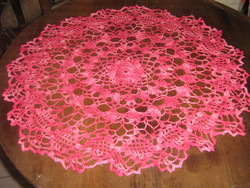 Beautiful hand-crocheted round lace tablecloth made of transition-colored yarn