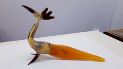 Colored glass bird with a small flaw