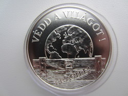 1994 Protect the world 1000 ft bu silver coin