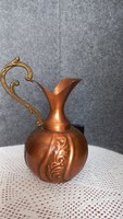 Handcrafted red copper pourer with brass tongs, marked, 20 cm high with tongs, inner opening approx. 2.5 cm.