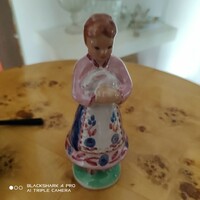 Ceramic little girl with a bunny.