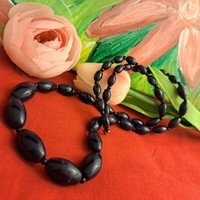Old porcelain string of beads. 60 cm