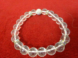 Bracelet made of white glass balls, rubber, with a decorative ball. Jokai.