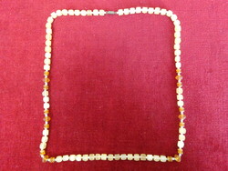 Cream-colored costume necklace, length 72 cm. Jókai
