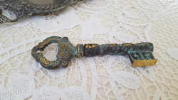A very nice, patinated key-shaped copper bottle opener and corkscrew