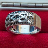 Silver ring with black and white zirconia stones, checkered pattern