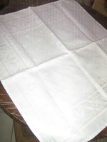 Beautiful white damask napkin or centerpiece in new condition
