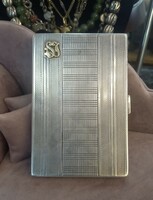 Antique silver cigarette case with gold monogram