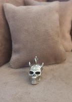 Silver charm skull