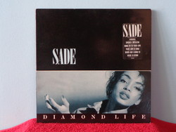 Sade's first album is for sale in ex/ex condition.