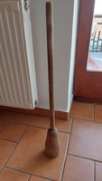 Old wooden cabbage thresher. Wooden peasant tool for decoration