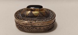 Decorative silver box with stone on top