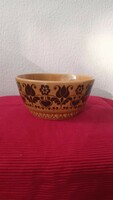 A vintage ceramic bowl with a flower pattern in beautiful condition.