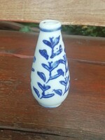 Old small violet vase with flower pattern