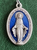 A very beautiful blue, enamel-decorated Marian pendant.