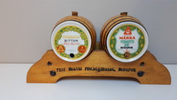 A pair of Hollóháza porcelain barrels on a wooden stand, brand Budafok