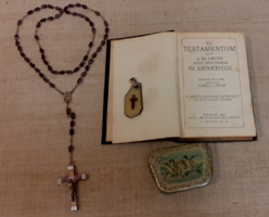 My New Testament prayer book from 1932. Amethyst rosary with holy ground capsule in the back