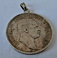 Old silver brand pendant from 1912