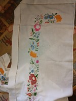 Hand-embroidered tablecloth or curtain