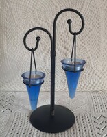 Blue glass candle holder on a black metal stand, number 2