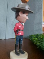 Royal Canadian Mounted Police figure with nodding head ~15 cm