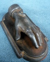 Old art nouveau cast iron hand-shaped paper weight