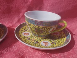 Famille jaune Chinese hand-painted yellow coffee cup bottom with longevity pattern.