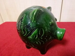 Green glazed ceramic bush, pig shape, height 12 cm. Jokai.